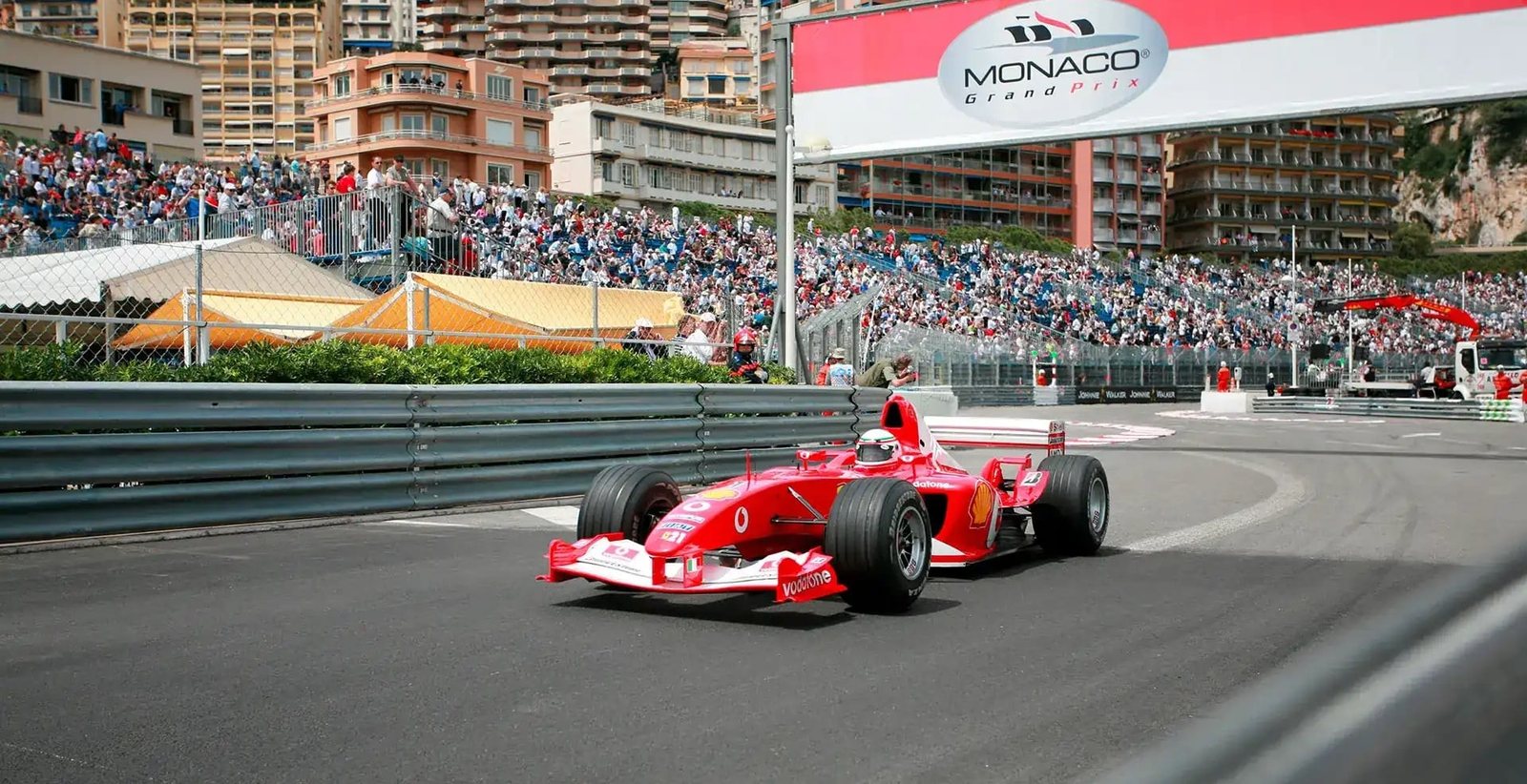 A Formula 1 car on the Monte-Carlo circuit, before the Casino, during the Monaco Grand Prix.
